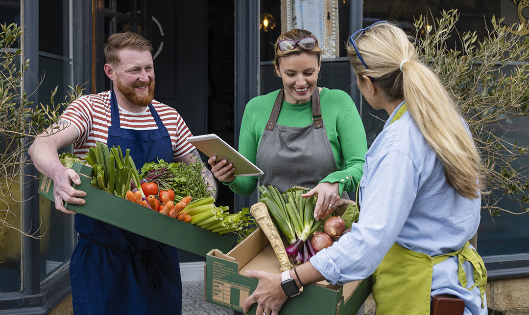 An abundance of sustainable produce on a fruit and veg stall.