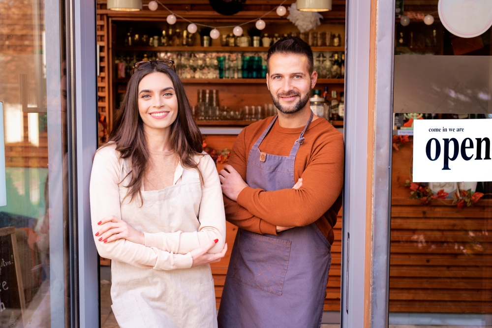 business owners at door