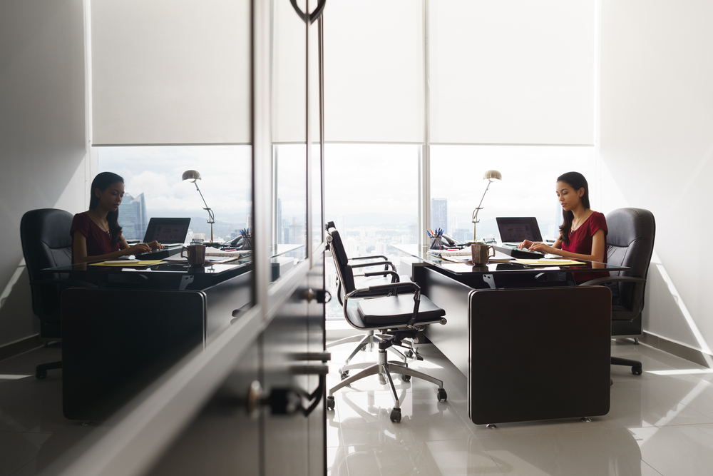 Woman at desk on laptop
