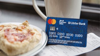 Ulster Bank debit card, ready to pay for a light snack and coffee bill.
