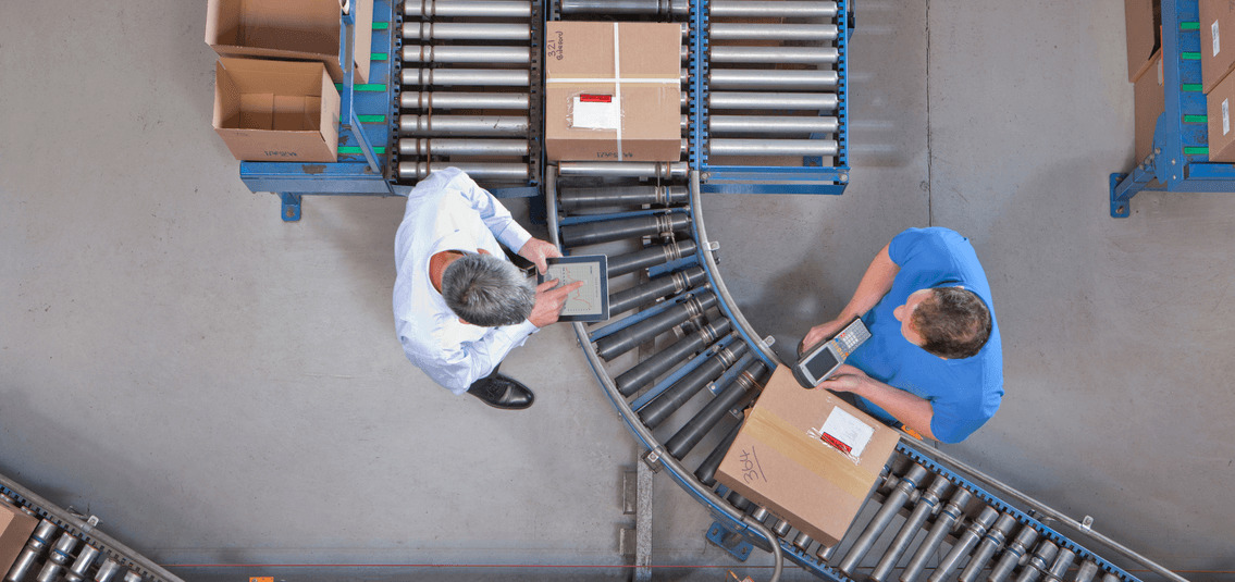 aerial view of people working on a packing production line