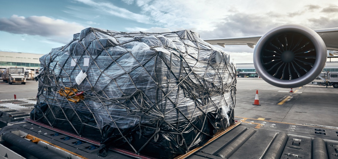 photo of cargo being loaded onto aircraft