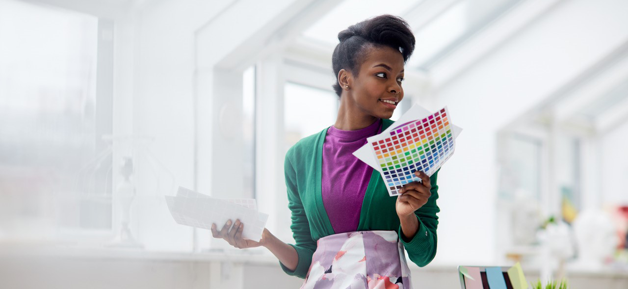 Woman holding papers in an office