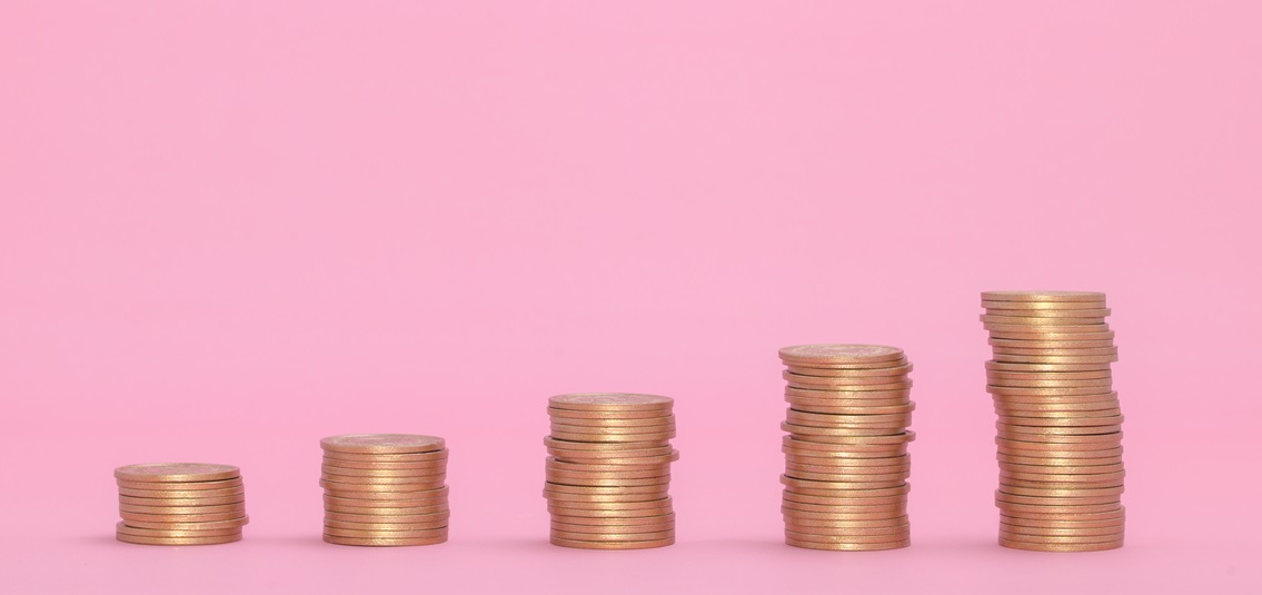 photo of five stacks of coins, each higher than the last