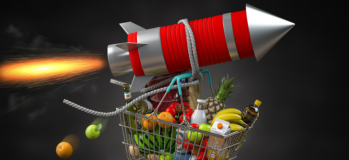 Image of rocket blasting off tied to a basket of groceries