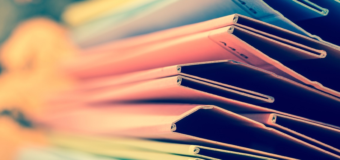 close-up photo of a stack of document folders