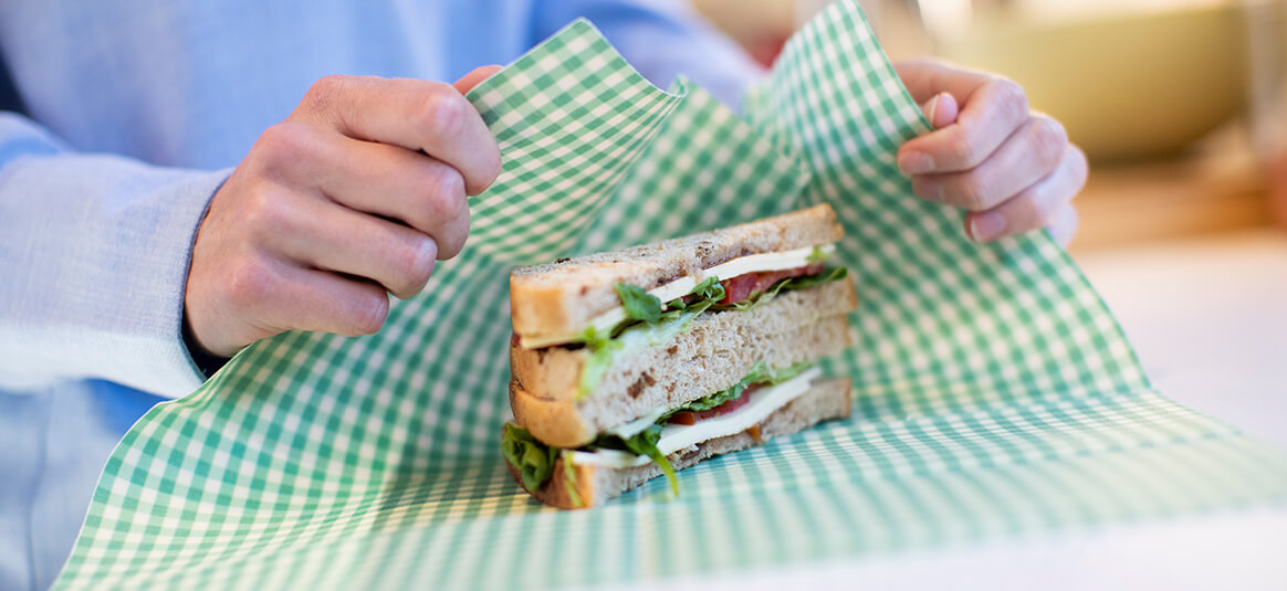 A sandwich about to be wrapped in an sustainable alternative to clingfilm