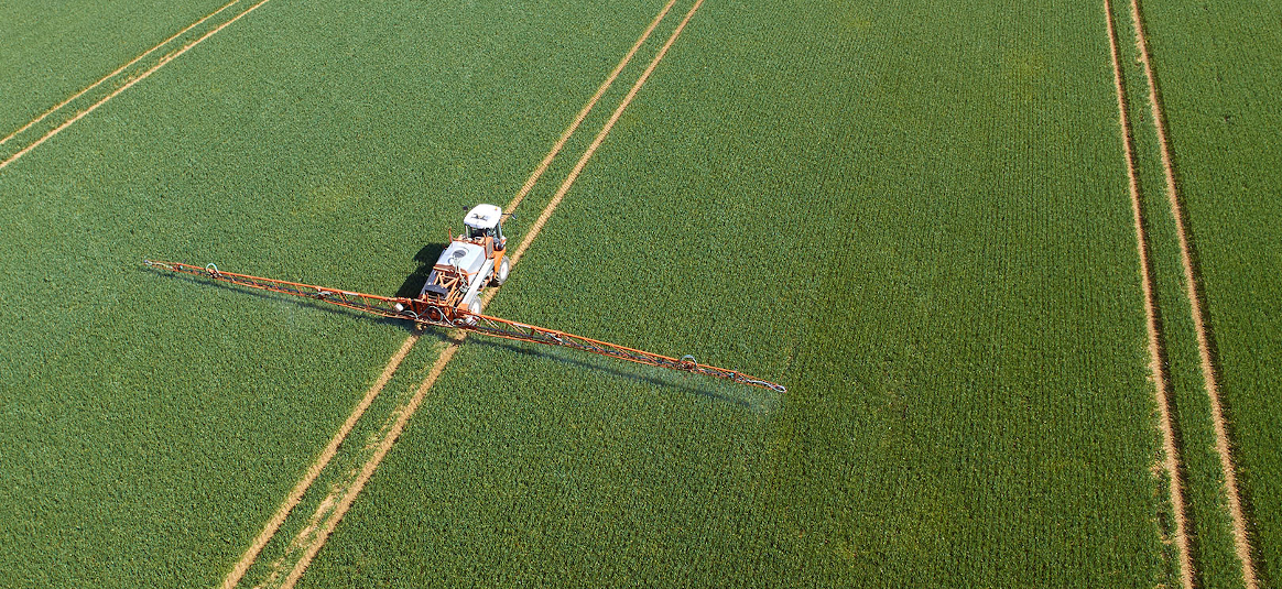 crop sprayer in field