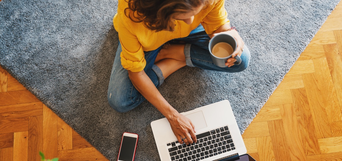 woman sat at a laptop