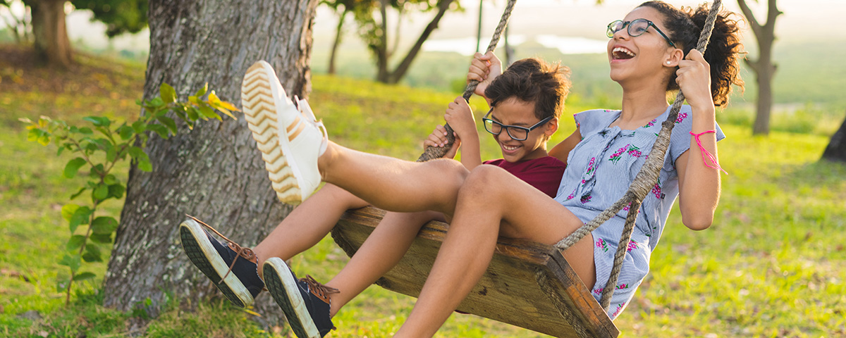 ages 11-17 girl smiling wiht braces