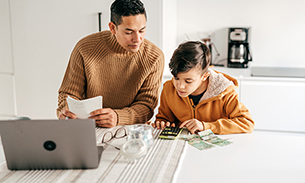 boy learning about money