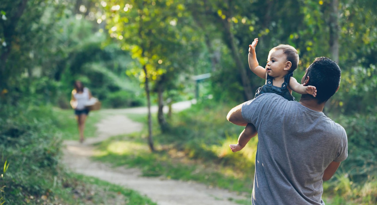 Father takes daughter on a walk