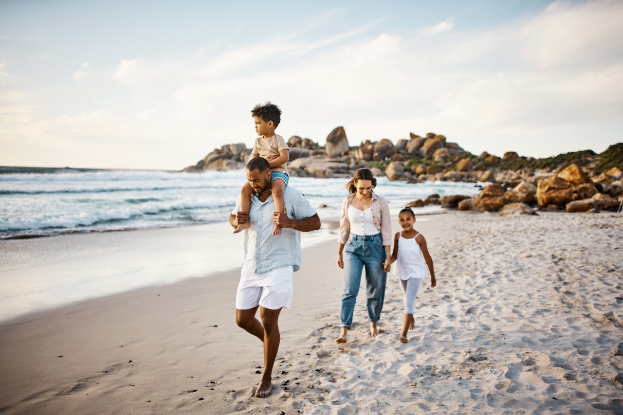 Family walking on the beach